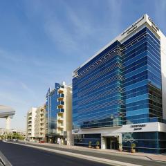 Отель Courtyard by Marriott Al Barsha 4*