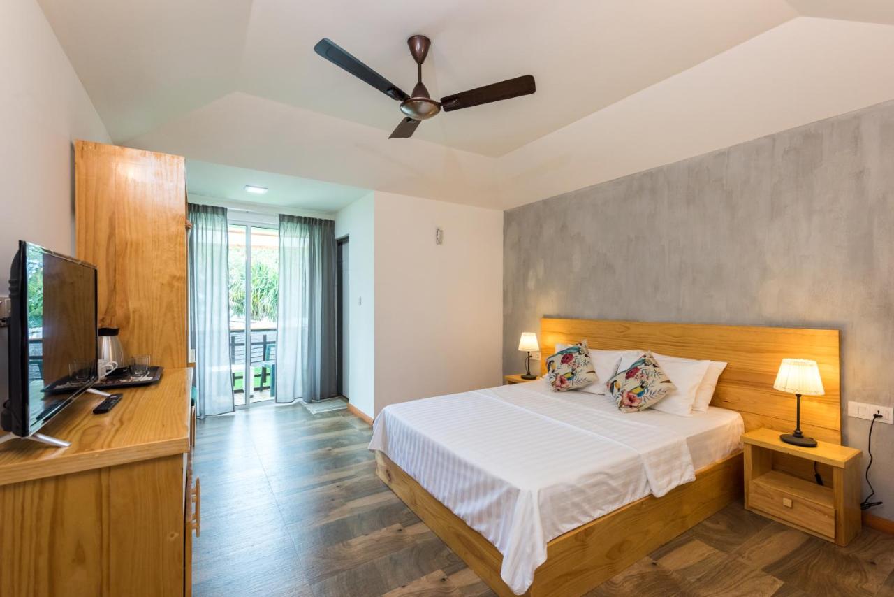 Isla Dhiffushi GUEST HOUSE, фото 6