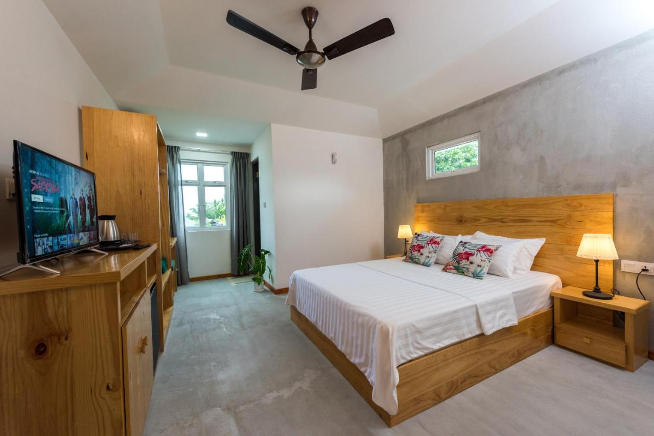 Isla Dhiffushi GUEST HOUSE, фото 9