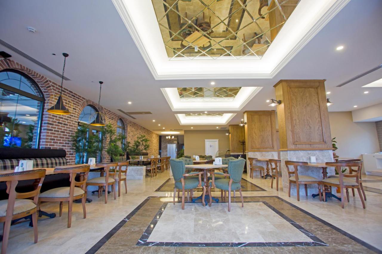 Elegance Asia Hotel, фото 12